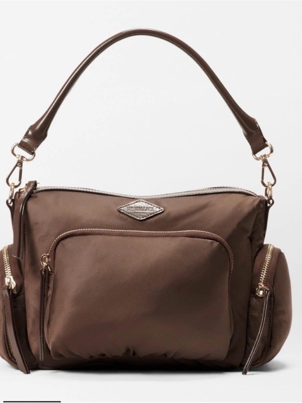 MZ Wallace Small Chelsea Nylon Crossbody Bag in a dark brown color